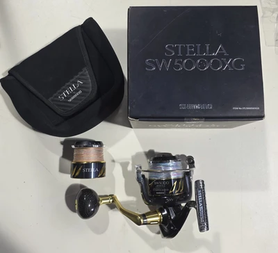 shimano - stella sw 5000xg+שפולה וחוטים+ידית קרבון