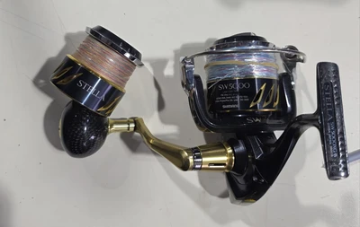 shimano - stella sw 5000xg+שפולה וחוטים+ידית קרבון